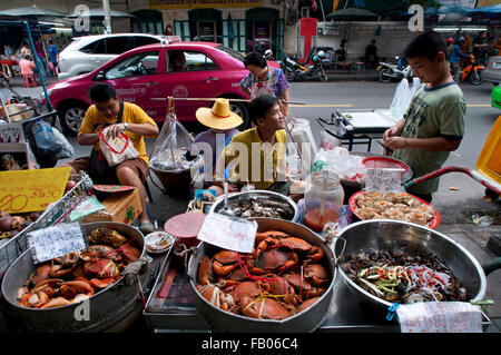 Shelfish stall food in Prachan Amulet Market in Bangkok, Thailand. The amulet market in Bangkok, Thailand. Buddhist amulets for Stock Photo