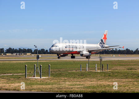 Jetstar Airbus A320 twin jet by aviation Weather station at Christchurch International Airport, South Island New Zealand Oceania Stock Photo