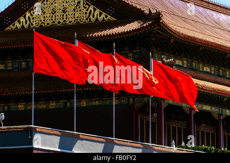 Beijing, China - Close up of the red flags on the Tiananmen Tower in the daytime. Stock Photo