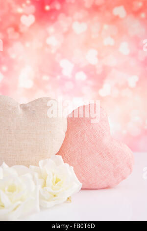 Valentine's hearts and roses with a bright glittering background. Stock Photo