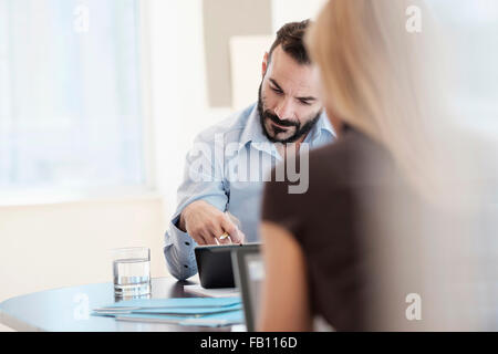 Man and woman working in office Stock Photo