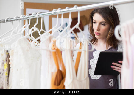 Female fashion designer in her office Stock Photo
