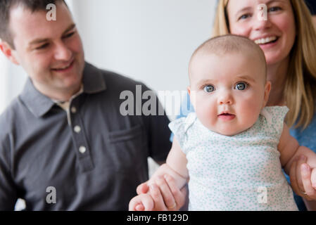 Parents with baby daughter (12-17 months) Stock Photo