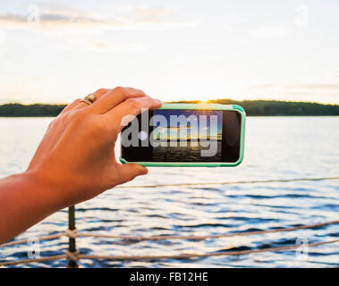 Woman taking picture with smartphone Stock Photo