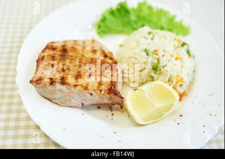 Grilled Pork Chop Dinner with Risotto Stock Photo