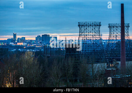 Skyline of the city of Essen, Germany, business district, city center, old cooling tower steel skeleton at Zeche Zollverein, Stock Photo