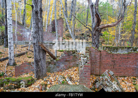 Remnants of the powerhouse in the abandoned village of Livermore, New Hampshire during the autumn months. This was a logging village. Stock Photo