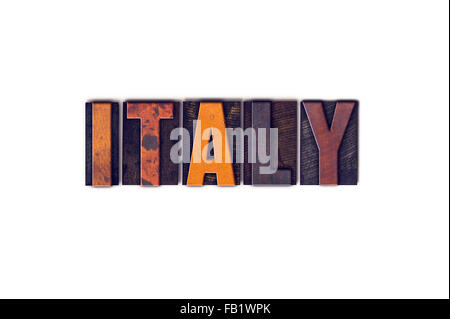 The word 'Italy' written in isolated vintage wooden letterpress type on a white background. Stock Photo