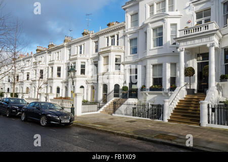 Luxury houses on Palace Gardens Terrace, residential street in Kensington, London England United Kingdom UK Stock Photo