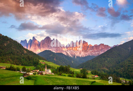 Santa Maddalena village in front of the Geisler or Odle Dolomites Group, Val di Funes, Val di Funes, Trentino Alto Adige, Italy, Stock Photo