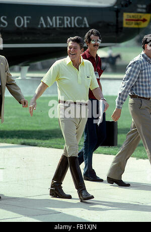Washington, DC., USA,  July 1981 President Ronald Reagan walks off Marine One after returning to Washington from Camp David where he and Vice-President George H.W. Bush where riding horses. Marine One landed at the alternate landing zone at the Rainbow Fountain on the monunent grounds Credit: Mark Reinstein Stock Photo