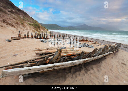 boat wreck at the Rossbeigh beach near Glenbeigh, County Kerry, Ring of Kerry Stock Photo