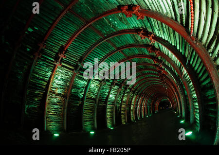 Green light tunnel in underground salt cathedral Zipaquira Stock Photo