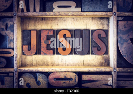 The word 'Jesus' written in vintage wooden letterpress type. Stock Photo