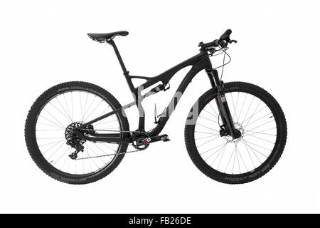 Carbon fibre 29er full suspension mountain bike on white background Stock Photo