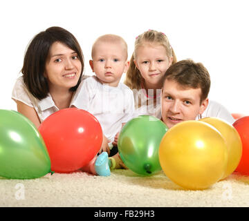 Family playing isolated on white Stock Photo