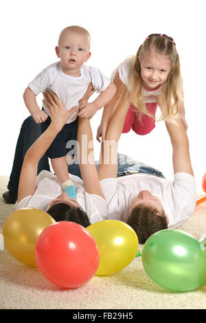 Family playing isolated on white Stock Photo