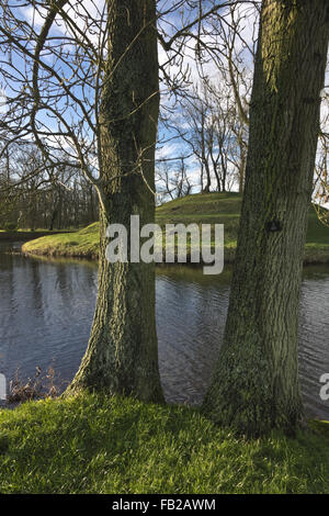 spiral snail mounts pond garden Lyveden New Bield, Northamptonshire England UK Stock Photo