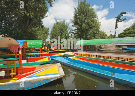 The colourful tourist boats on the canals of Xochimilco in Mexico City, Mexico, South America Stock Photo