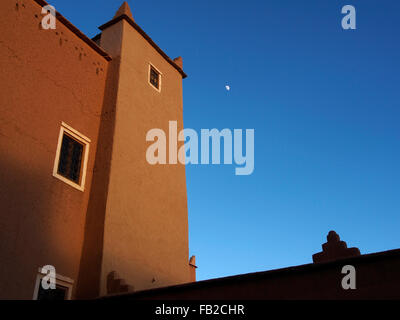 Moon at sunset, Kasbah Imoukdal, N' Kob, Morocco Stock Photo