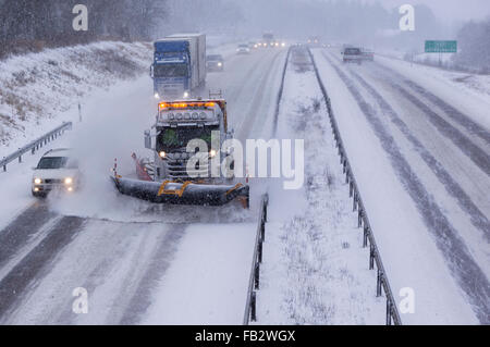 Sweden Weather: E20, Floda, Sweden, 8th Feb 2016. First major snowfall of the year causes traffic accidents and widespread travel disruptions. Snowplows and gritters are deployed to keep E20 motorway open.  Model Release: No.  Property Release: No. Stock Photo