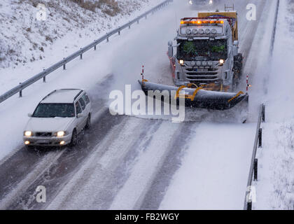 Sweden Weather: E20, Floda, Sweden, 8th Feb 2016. First major snowfall of the year causes traffic accidents and widespread travel disruptions. Snowplows and gritters are deployed to keep E20 motorway open.  Model Release: No.  Property Release: No. Stock Photo