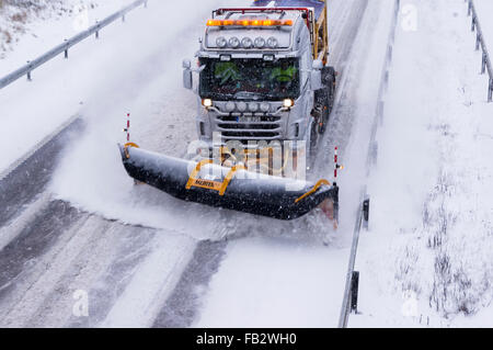 Sweden Weather: E20, Floda, Sweden, 8th Feb 2016. First major snowfall of the year causes traffic accidents and widespread travel disruptions. Snowplows and gritters are deployed to keep E20 motorway open.  Model Release: No.  Property Release: No. Stock Photo