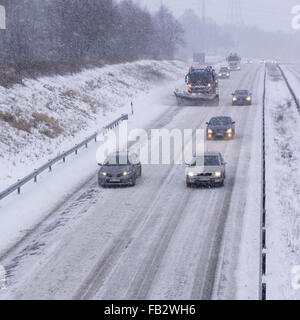 Sweden Weather: E20, Floda, Sweden, 8th Feb 2016. First major snowfall of the year causes traffic accidents and widespread travel disruptions. Snowplows and gritters are deployed to keep E20 motorway open.  Model Release: No.  Property Release: No. Stock Photo