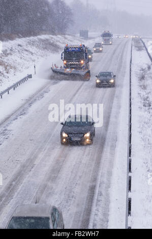 Sweden Weather: E20, Floda, Sweden, 8th Feb 2016. First major snowfall of the year causes traffic accidents and widespread travel disruptions. Snowplows and gritters are deployed to keep E20 motorway open.  Model Release: No.  Property Release: No. Stock Photo