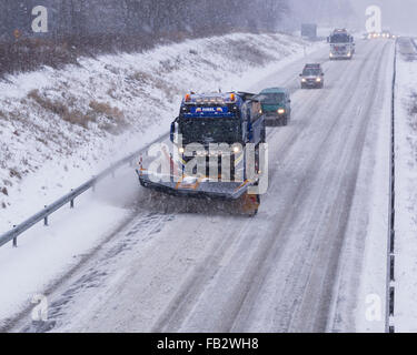 Sweden Weather: E20, Floda, Sweden, 8th Feb 2016. First major snowfall of the year causes traffic accidents and widespread travel disruptions. Snowplows and gritters are deployed to keep E20 motorway open.  Model Release: No.  Property Release: No. Stock Photo