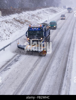 Sweden Weather: E20, Floda, Sweden, 8th Feb 2016. First major snowfall of the year causes traffic accidents and widespread travel disruptions. Snowplows and gritters are deployed to keep E20 motorway open.  Model Release: No.  Property Release: No. Stock Photo