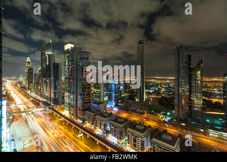 United Arab Emirates, Dubai, Sheikh Zayed Rd, traffic and new high rise buildings along Dubai's main road Stock Photo