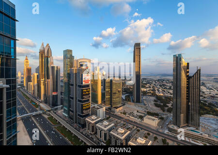 United Arab Emirates, Dubai, Sheikh Zayed Rd, traffic and new high rise buildings along Dubai's main road Stock Photo