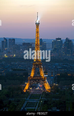 Paris elevated night city skyline with illuminated Eiffel tower and La Defense district, France, Europe Stock Photo