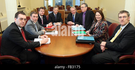 Six assembly members - three from the DUP and three from Sinn Fein meet for the first time to examine the issue of parading. (from left to right)  Stephen Moutray, Nelson McCausland, Jeffrey Donaldson from the DUP, (Chaired by) The Northern Ireland's First Minister Peter Robinson and Deputy First Minister Martin McGuinness, meet Gerry Kelly, Michelle Gildernew and John O'Dowd from Sinn Fein at Stormont Castle, Stormont, Belfast, Feb 9th, 2010. This new Parading Body has until 23rd February to come up with agreed outcomes capable of achieving cross-community support and try to find a way to dea Stock Photo
