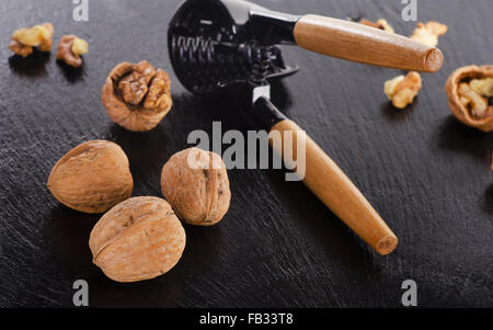 Walnuts on  black background. Selective focus Stock Photo
