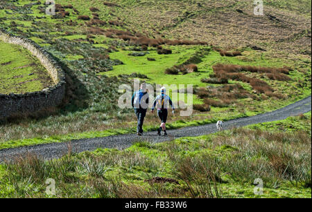 Two walkers walking in the Brecon Beacons National Park south Wales Stock Photo