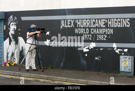 Irish Snooker star Higgins dies. Flowers are laid beneath a mural of former snooker champion Alex Higgins, near his home in south Belfast. Monday July 26th, 2010. Higgins' body was discovered after concerned friends broke into his Belfast flat having failed to contact him by phone. It is not known how long he had been dead inside the apartment. Stock Photo