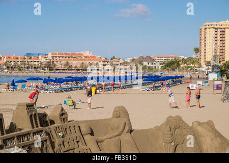 Groups of retirees playing petanque with steel bowls on the sandy beach of Las Vistas in Los Cristianos, Tenerife, Canary Island Stock Photo