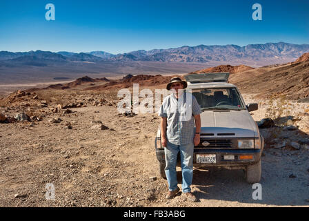 Traveler at Ashford Mine Road, Black Mountains, Death Valley in dist, Mojave Desert, Death Valley National Park, California, USA Stock Photo