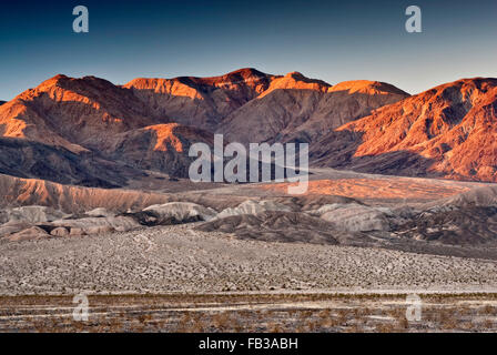 Owlshead Mountains over Confidence Hills in Mojave Desert, sunrise from Jubilee Pass Road, Death Valley Nat Park, California Stock Photo