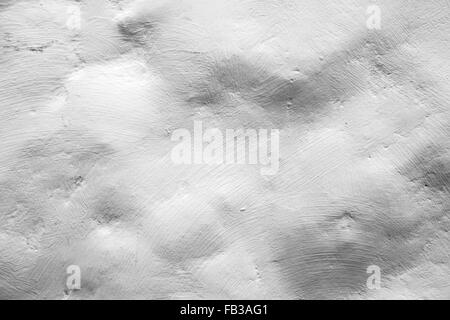 Rough white painted stone wall, closeup background photo texture Stock Photo