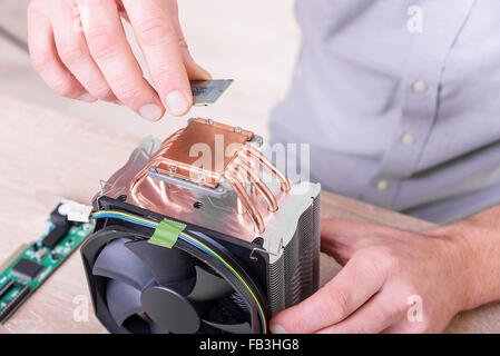 Cpu cooler installation. Stock Photo