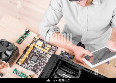 Computer repair professional. Stock Photo