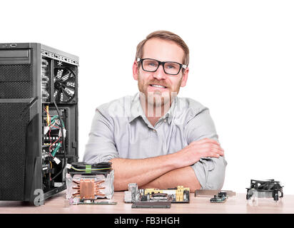 Computer engineer at workplace. Stock Photo