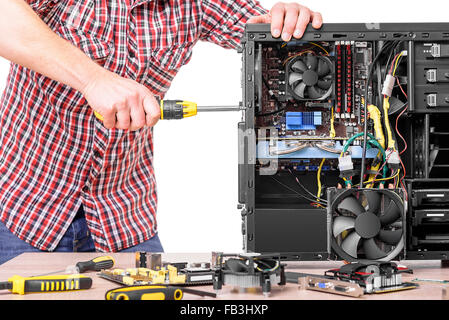 Technician repair assembles computer. Stock Photo