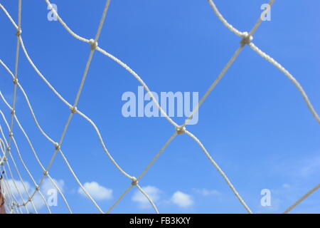net on the blue sky background during the daytime Stock Photo