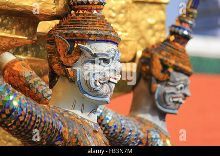 Giant Statue at The Emerald Buddha Temple in Bangkok Stock Photo