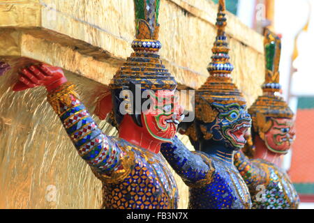 Giant Statue at The Emerald Buddha Temple in Bangkok Stock Photo