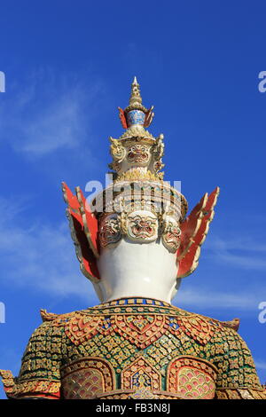 background of behide giant statue at temple of the emerald buddha in bangkok Stock Photo